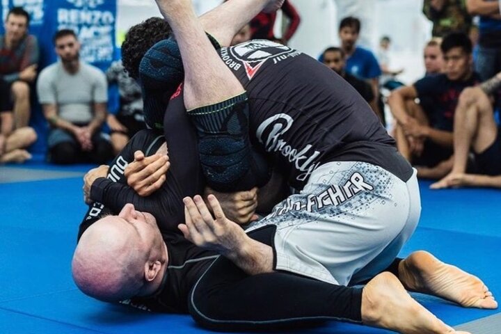 AI-Powered Coaching App Replaces Regional Instructor Who Was Already Just Playing A Danaher Instructional On The Wall TV; Members Report Experience Is 'Actually A Little More Patient'